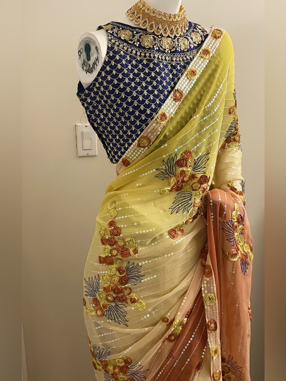 Elegant Yellow & Brown Floral Saree with Sequin Accents